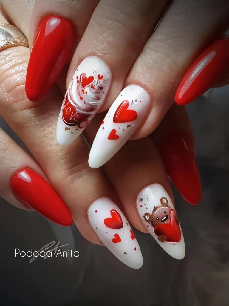 Святковий дизайн нігтів до дня закоханих з романтичними наліпками та малюнками